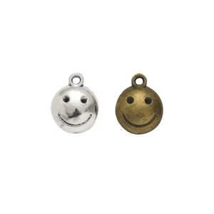 Ciondoli vintage a forma di faccina sorridente in argento e bronzo per bijoux fai-da-te