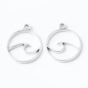 Pair of vintage silver alloy round pendants with a minimalist hollow wave design