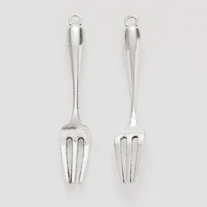 Pair of vintage silver alloy fork pendants with top rings for DIY jewelry making and crafts