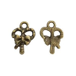 Antik-Bronze Zuckerstangen-Anhänger aus Legierung für DIY-Schmuck mit festlichem Bogen