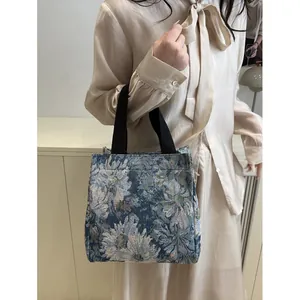 Retro floral jacquard handbag with black straps for stylish daily commuting and casual wear