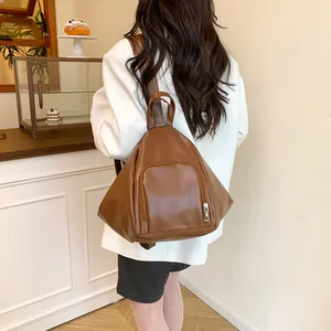 Stylish brown PU leather teardrop backpack with silver zippers and spacious interior
