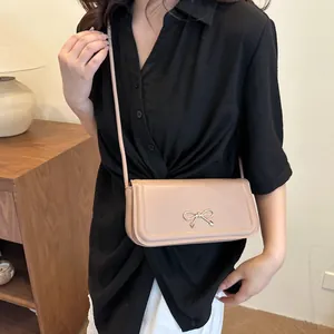 Petit sac carré croisé à nœud papillon doré chic en cuir PU couleur abricot doux