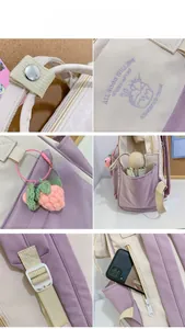 Detail view of purple small backpack featuring embroidery and side pockets for storage