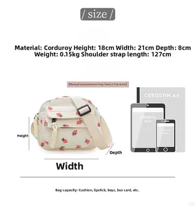 Size guide of strawberry print corduroy crossbody bag with dimensions and capacity details