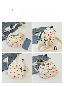 Detailed four-angle views of the strawberry print corduroy crossbody bag with multiple pockets