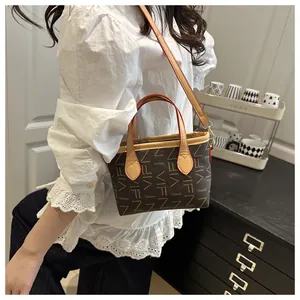 Detailed shot of a vintage bucket tote bag worn by a model in a lifestyle setting