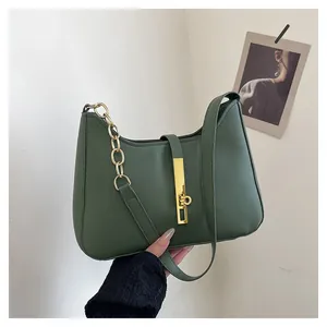 Deep green leather hobo bag for women with gold metal buckle and chain accent
