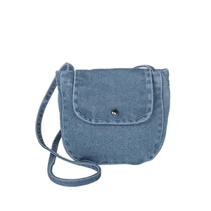 Retro denim shoulder bag in blue with silver button clasp and matching strap
