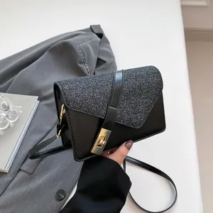 French vintage crossbody bag in black leather and silver glitter with gold clasp