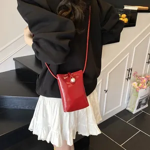 Bolso tipo cubo rojo brillante con cierre de perla para mujer estilo chic