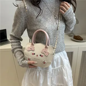 Bolso bandolera crema elegante con diseño de gato y asa rosa para mujer
