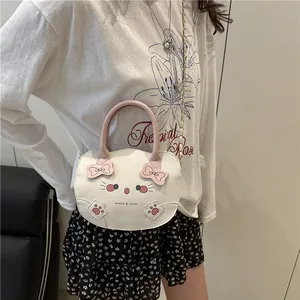 Lindo bolso bandolera con forma de gato blanco y rosa con lazos y cadena metálica