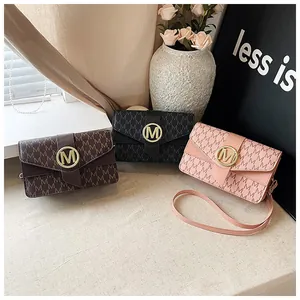 Three elegant small crossbody bags with M-letter pattern and gold metal logo details