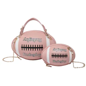 Pink rugby-shaped shoulder bag set with gold chain strap and textured faux leather surface