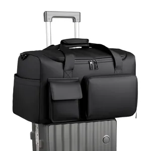 Borsa da viaggio nera ad alta capacità con fascia per fissaggio a trolley da viaggio