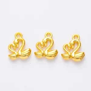 Trois breloques cygne dorées en alliage de zinc pour accessoires de création de bijoux DIY