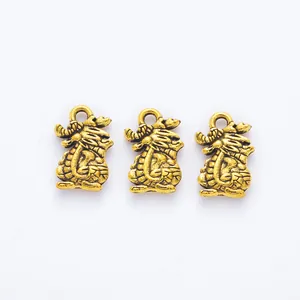 Set of three vintage gold zinc alloy dragon pendants for DIY jewelry making accessories