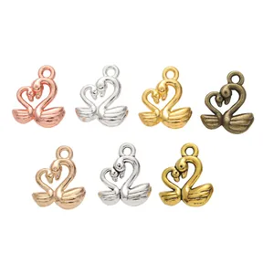 Pendentifs cygne en forme de coeur en finitions or argent bronze et or rose
