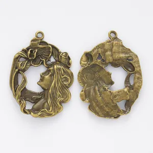 Art Nouveau style vintage female profile relief metal pendant with floral details