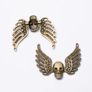 Vintage bronze skull with wings alloy pendant DIY jewelry findings shown from both sides