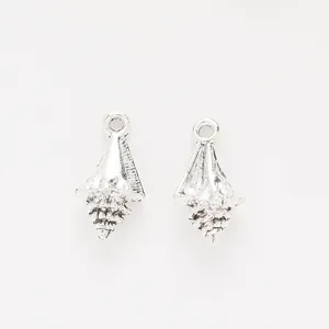 Pair of vintage silver alloy conch shell charms for DIY jewelry and necklaces