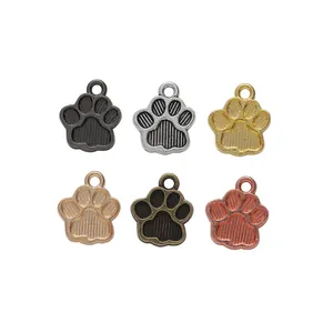 Set of six colorful DIY metal paw pendants in gold silver and bronze for jewelry making