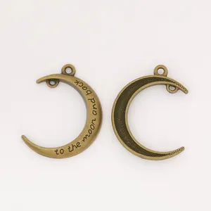 Vintage bronze moon pendants set with 'to the moon and back' engraving for DIY jewelry