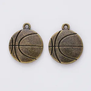 Set of two vintage bronze basketball pendants with realistic textures for DIY jewelry