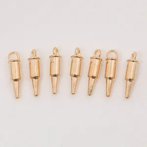 Set of seven gold-finished bullet-shaped pendants with integrated hanging loops for DIY jewelry
