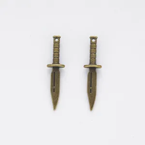 Pair of vintage bronze alloy dagger pendants for DIY jewelry making and keychains