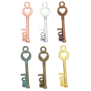 Set of six alloy heart key pendants in assorted metal finishes with love lettering
