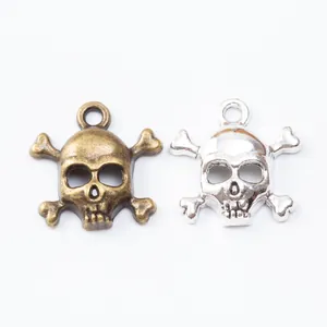 Vintage zinc alloy skull and crossbones pendants in bronze and silver for DIY jewelry