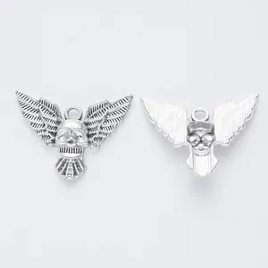 Retro zinc alloy skull wing pendants for DIY jewelry making in antique silver finish