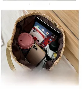 Internal view of a woven straw bucket bag showing large capacity for daily items