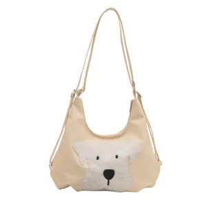 Minimalist beige half-moon shoulder bag with cute plush puppy design for women