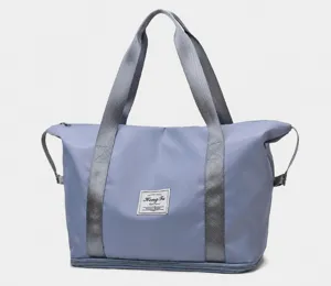 Blaue Reisetasche mit großem Fassungsvermögen, Reißverschlussfach und verstärkten Griffen
