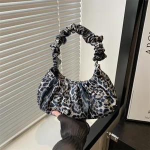 Fashionable leopard print pleated cloud bag with scrunchie handle for autumn styling