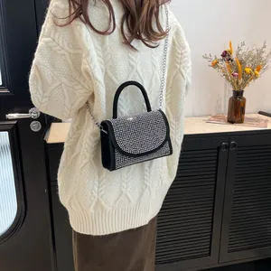 Elegant black crossbody bag with sparkling silver rhinestone flap and metal chain strap