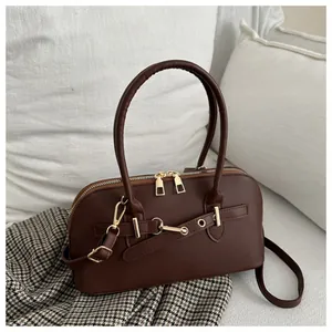 Classic dark brown leather hobo bag with gold horsebit hardware and adjustable strap