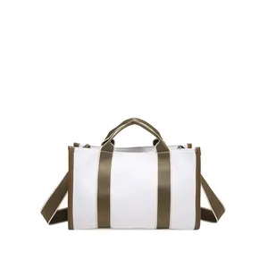 Classic large canvas tote bag in beige with brown trim for winter commuting