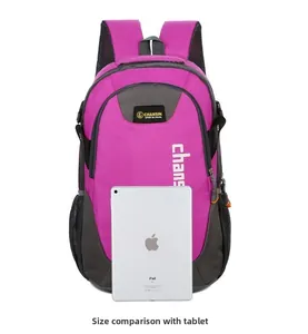 Pink and grey outdoor backpack size comparison with a tablet for scale reference