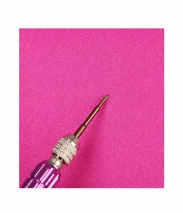 Detail showing high-density fabric with scratch and wear resistant metal tool test