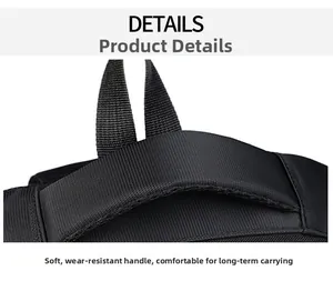 Detail of the reinforced top handle and durable nylon fabric on this black backpack