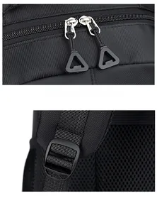 Detail of durable dual zippers and breathable mesh shoulder straps on a black backpack