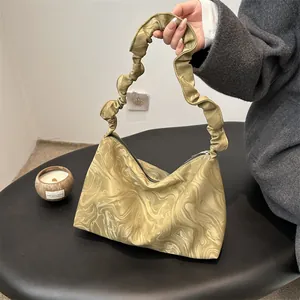 Chic green marble texture tote bag with pleated handle and zipper for stylish commuting