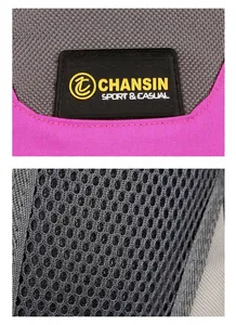 Detail of rose pink nylon fabric with rubber logo and breathable grey honeycomb mesh