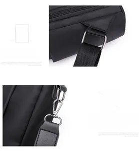 Detail of silver metal buckles and detachable shoulder strap on black nylon backpack