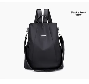 Front view of black anti-theft nylon backpack for women with silver logo and removable strap