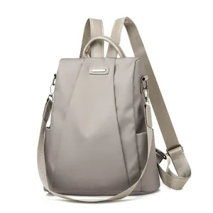 Waterproof nylon anti-theft backpack for women in khaki with detachable shoulder strap